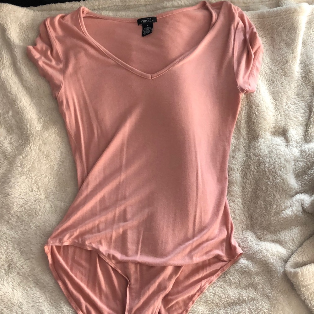Pink body suit